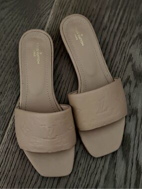 Louis Vuitton Beige Embossed Monogram Slides